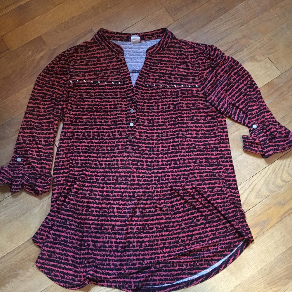 Woman’s size S top.